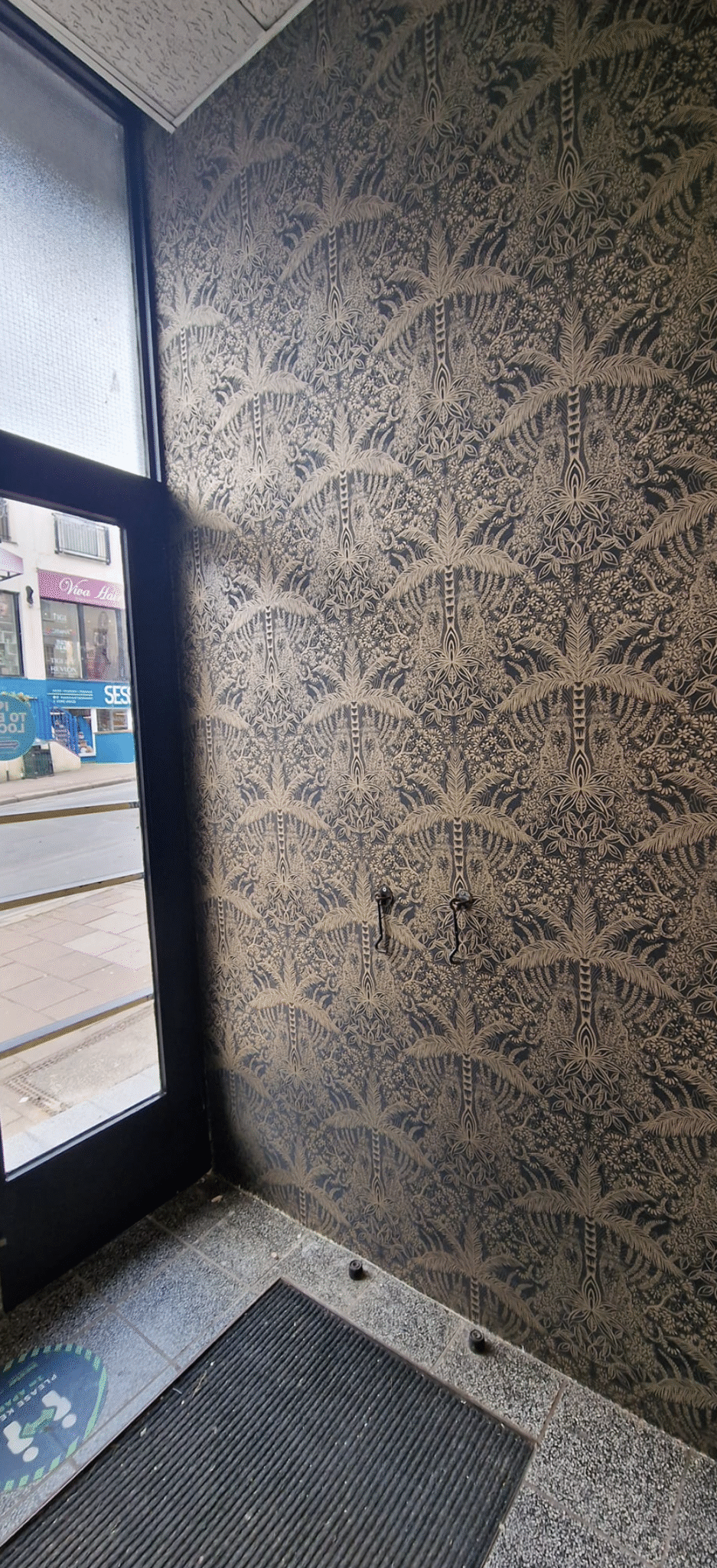 Newly decorated interior feature wall inside a shop with smooth paintwork and modern finishes