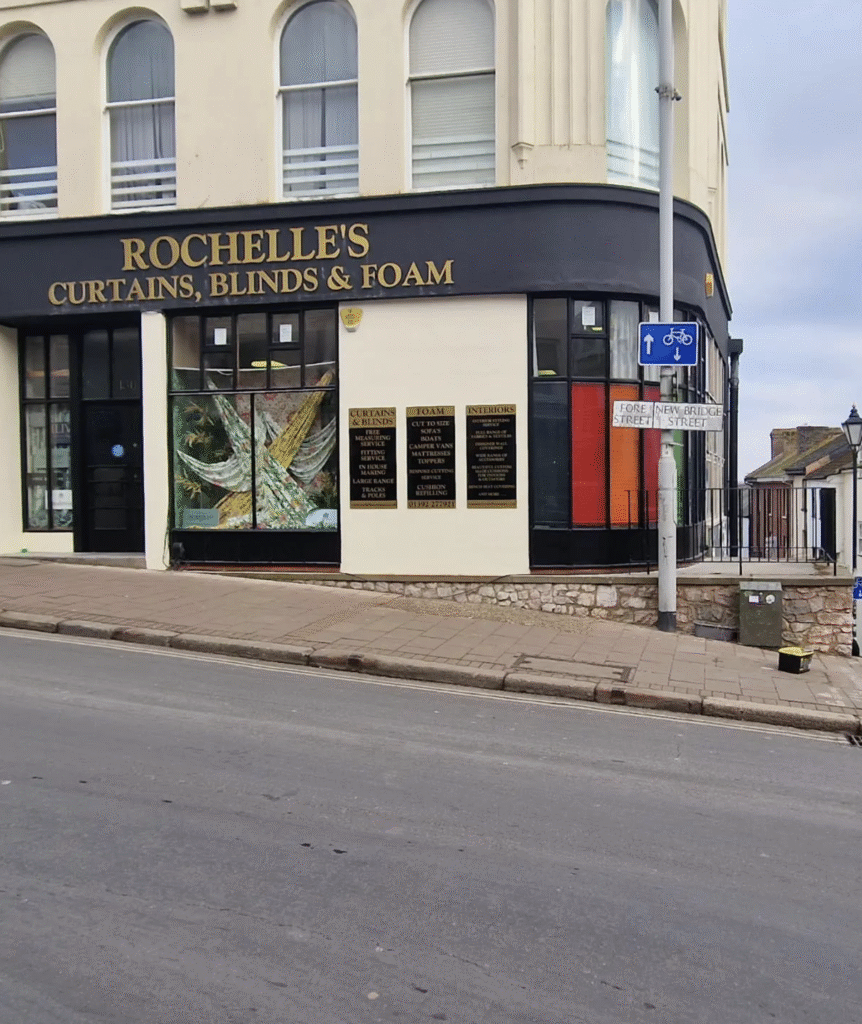 Street view of a freshly painted shop exterior after professional commercial redecoration in Exeter