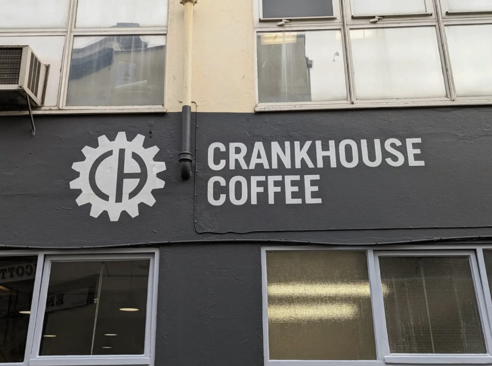 Repainted signage area above coffee shop entrance
