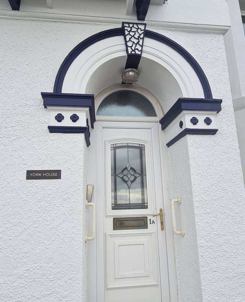 Freshly repainted front door and entrance area on a residential property